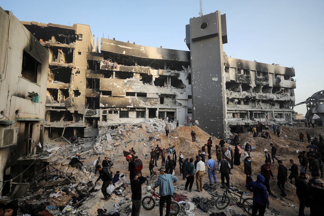 Palestinians inspect the destruction wrought by an Israeli military raid at Al-Shifa Hospital, northern Gaza, in April. A rights group alleged Israel has systematically targeted medical workers in the enclave.