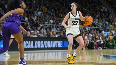 Apr 1, 2024; Albany, NY, USA; Iowa Hawkeyes guard Caitlin Clark (22) controls the ball against LSU Lady Tigers forward Angel Reese (10) in the third quarter in the finals of the Albany Regional in the 2024 NCAA Tournament at MVP Arena.