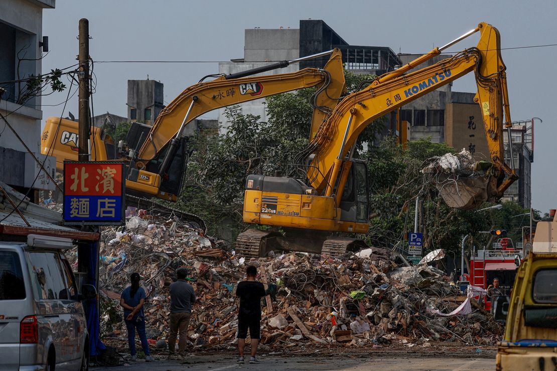 Workers demolish a damaged building following the earthquake, in Hualien, Taiwan April 4, 2024.