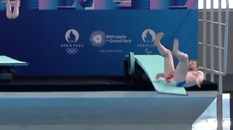 Alexis Jandard fell off the diving board at the inaugaration of the Olympic pool.