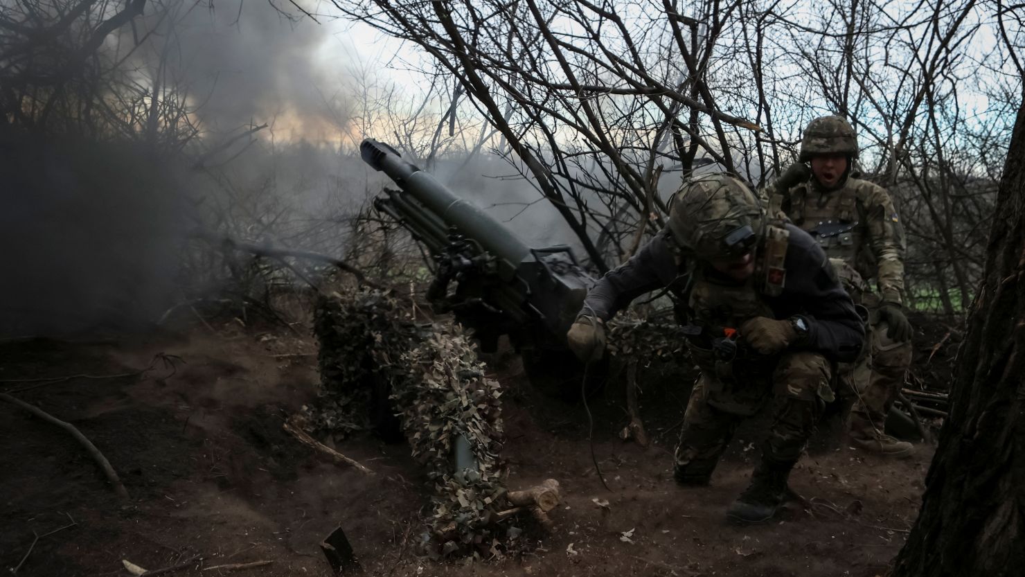 Servicemen of the 12th Special Forces Brigade Azov of the National Guard of Ukraine fire a howitzer toward Russian troops in Donetsk region, Ukraine, on April 5, 2024.