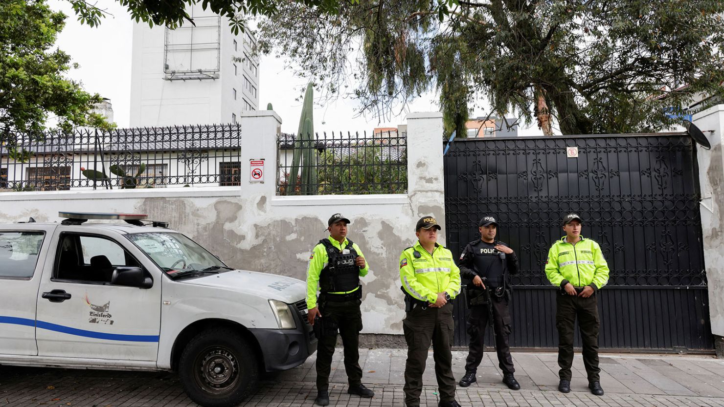 Ecuadorian police officers stand guard outside Mexico's embassy in Quito, Ecuador, on April 5, 2024.