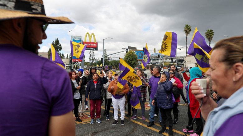 California fast food workers hold a rally as they celebrate their minimum wage increase to $20 an hour during an event in Los Angeles, California, on April 5, 2024.