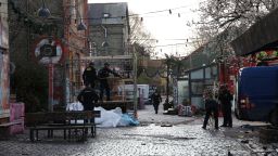 Police clear booths used to sell cannabis from an area known as "Pusher Street" early in the morning in Freetown Christiania in Copenhagen, Denmark, April 6, 2024.