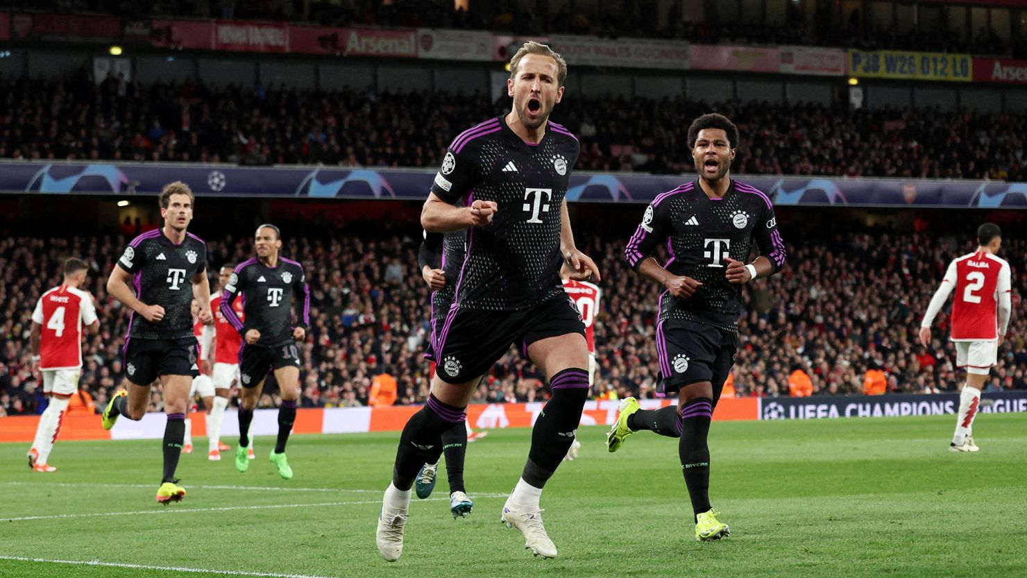 Harry Kane celebrates after putting Bayern Munich ahead from the penalty spot.