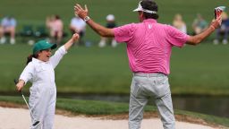 Golf - The Masters - Augusta National Golf Club, Augusta, Georgia, U.S. - April 10, 2024
Bubba Watson of the U.S. with his daughter Dakota on the 6th hole during the par 3 contest REUTERS/Mike Blake