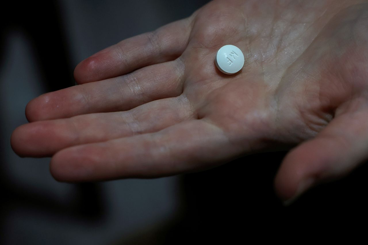 A patient prepares to take Mifepristone at a clinic in Carbondale, Illinois, on April 9.