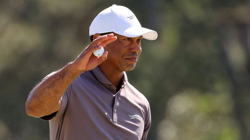 The Masters: Tiger Woods conquers marathon 23-hole day to make record-breaking 24th consecutive cut at Augusta