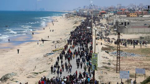 Palestinians, who were displaced by Israel's military offensive on south Gaza, make their way as they attempt to return to their homes in north Gaza, amid the ongoing conflict between Israel and Hamas, as seen from central Gaza Strip April 14, 2024.