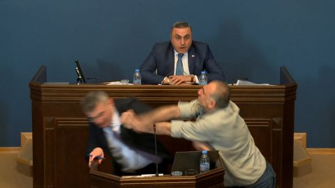 Mamuka Mdinaradze, leader of the ruling Georgian Dream party's parliamentary faction, is punched in the face by opposition MP Aleko Elisashvili during discussion of the bill on "foreign agents" in the Parliament, Tbilisi, Georgia, April 15, 2024 in this still image taken from a live broadcast video.  Parliament of Georgia/Handout via REUTERS  ATTENTION EDITORS - THIS IMAGE WAS PROVIDED BY A THIRD PARTY. NO RESALES. NO ARCHIVES. MANDATORY CREDIT