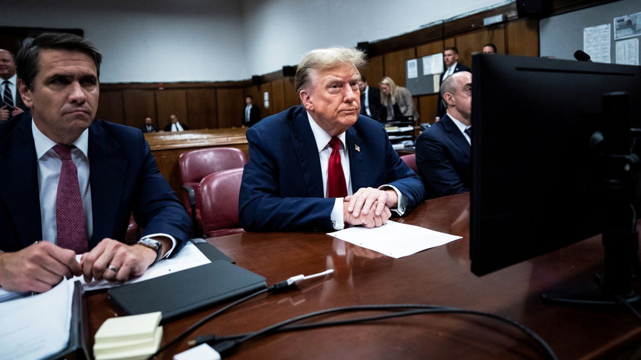 Former U.S. President Donald Trump arrives at Manhattan criminal court with his legal team ahead of the start of jury selection in New York, NY, U.S., on Monday, April 15, 2024. Trump faces 34 felony counts of falsifying business records as part of an alleged scheme to silence claims of extramarital sexual encounters during his 2016 presidential campaign. Jabin Botsford/Pool via REUTERS