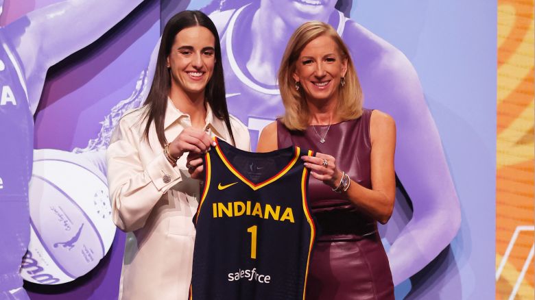 Apr 15, 2024; Brooklyn, NY, USA; Caitlin Clark poses with WNBA commissioner Cathy Engelbert after she is selected with the number one overall pick to the Indiana Fever in the 2024 WNBA Draft at Brooklyn Academy of Music. Mandatory Credit: Brad Penner-USA TODAY Sports