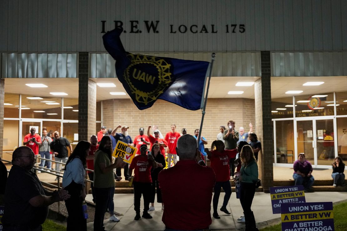 People celebrate as the result of a vote comes in favor of the hourly factory workers at Volkswagen's assembly plant to join the United Auto Workers (UAW) union, at a watch party in Chattanooga, Tennessee, on April 19.