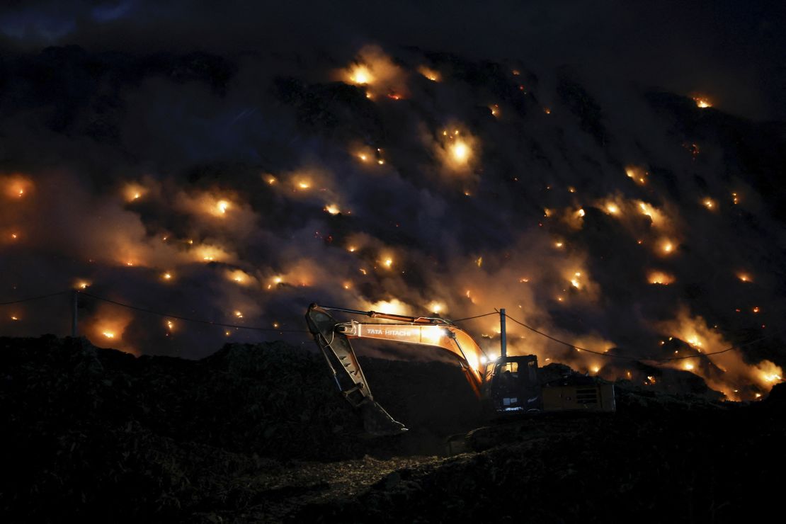 Fires burning at Ghazipur landfill site in New Delhi, India, April 22, 2024.