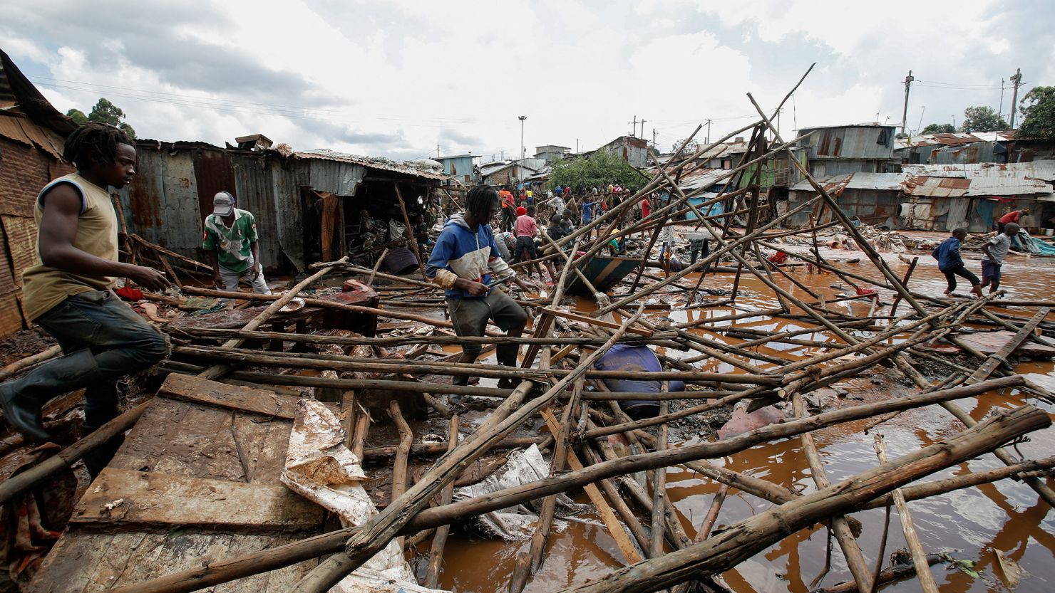 Residents sift through the rubble as they recover their belongings after the Nairobi river burst its banks and destroyed their homes within the Mathare Valley settlement in Nairobi, Kenya on April 24, 2024.