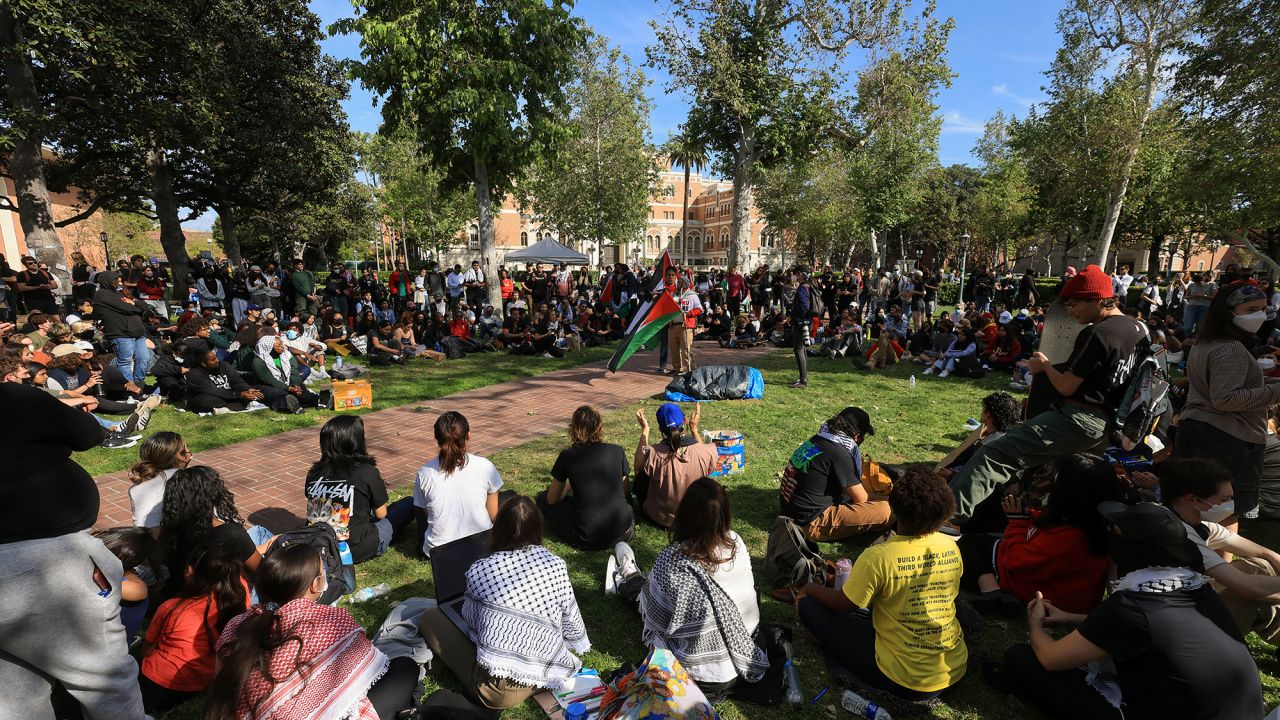 Demonstrators gather after students built a protest encampment in support of Palestinians at the University of Southern California's (USC) Alumni Park, during the ongoing conflict between Israel and the Palestinian Islamist group Hamas, in Los Angeles, California, U.S., April 24, 2024.