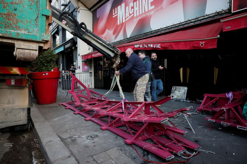 The broken sails of the Moulin Rouge's landmark red windmill.