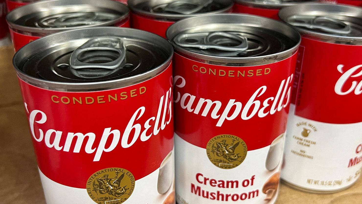 Cans of Campbell's cream of mushroom soup line a supermarket shelf in Bellingham, Washington, U.S. April 25, 2024.