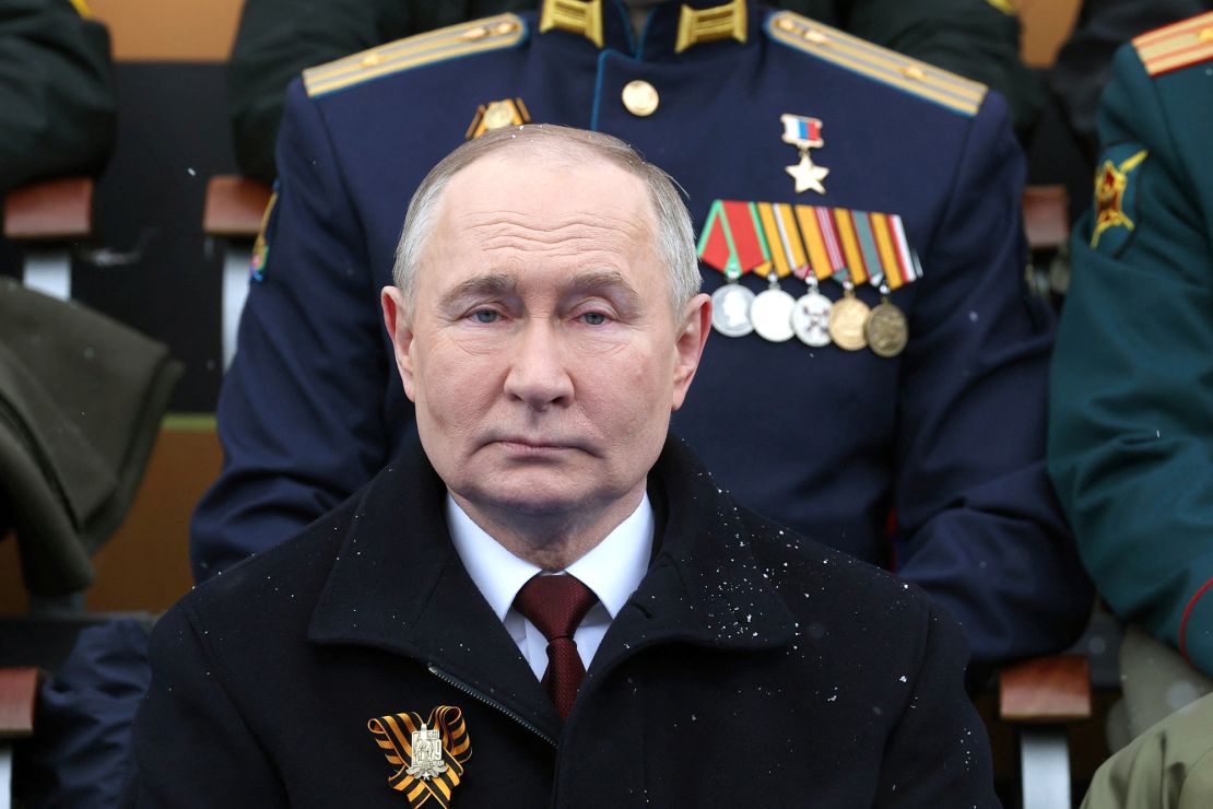 Putin attends the military parade.
