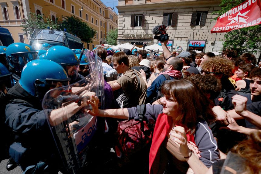 Demonstrators clash with police during protest 