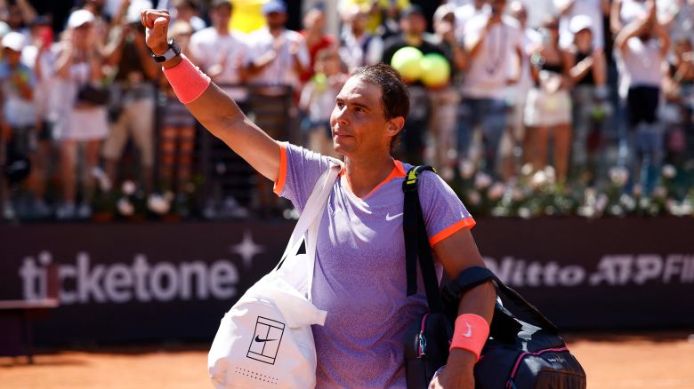 Rafael Nadal waves to the crowd after his second round defeat at the Italian Open.