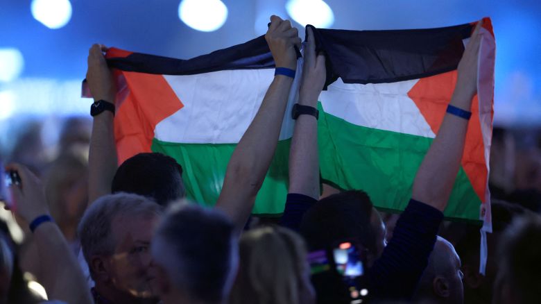 Audience members hold Palestinian flags in the crowd during the final dress rehearsal before the 68th edition Eurovision Song Contest final at Malmo Arena, in Malmo, Sweden May 11, 2024.