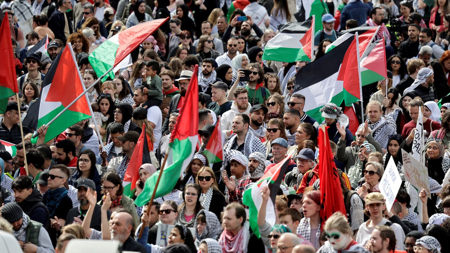 Demonstrators hold Palestinian flags during a protest against Israeli participation in the Eurovision Song Contest ahead of the Grand Final in Malmo, Sweden, on May 11, 2024.