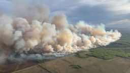 Smoke rises from mutual aid wildfire GCU007 in the Grande Prairie Forest Area near TeePee Creek, Alberta, Canada May 10, 2024. Alberta Wildfire/Handout via REUTERS   THIS IMAGE HAS BEEN SUPPLIED BY A THIRD PARTY. NO RESALES. NO ARCHIVES