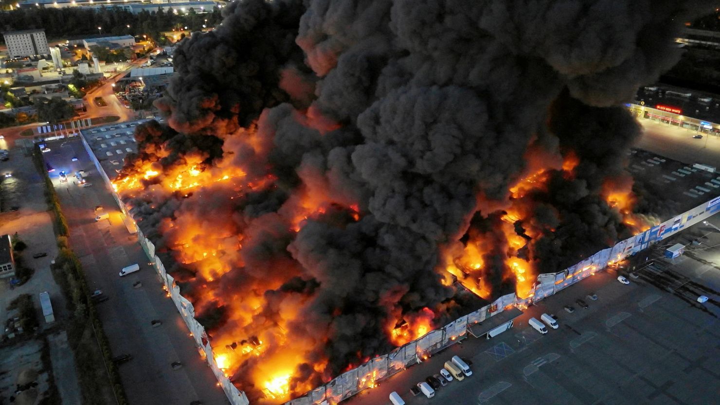 Polish authorities said Russia appears to be behind a large fire that consumed a shopping center in Warsaw.