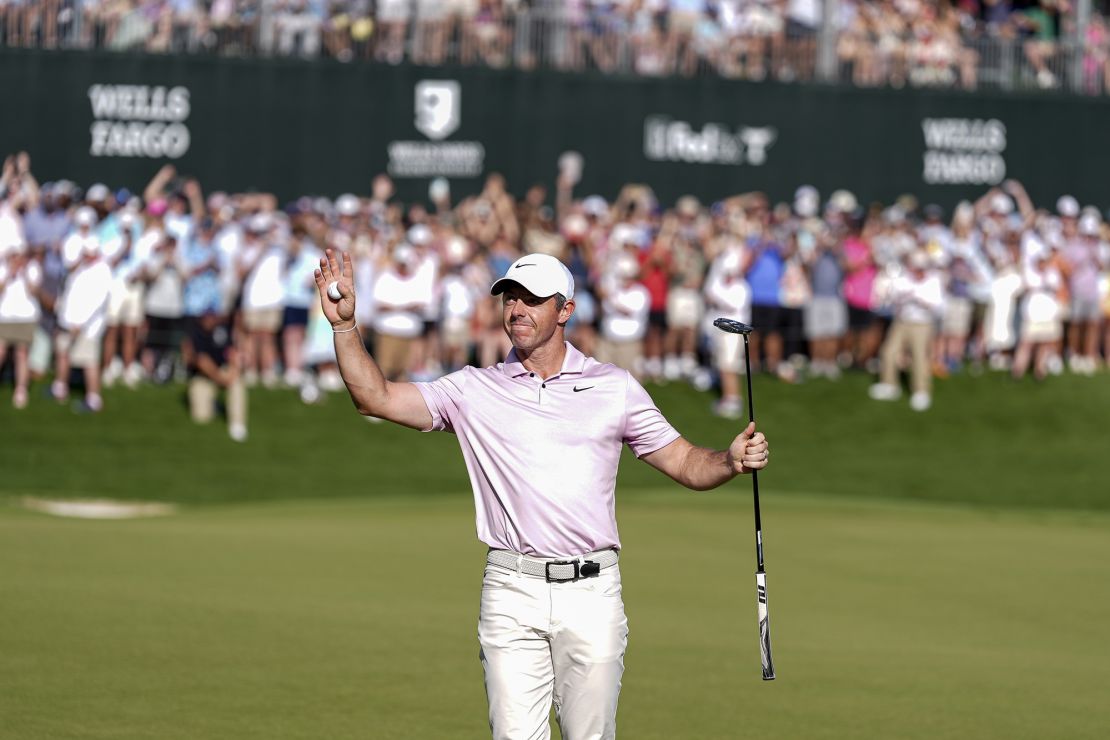McIlroy salutes the crowd after another win at Quail Hollow.