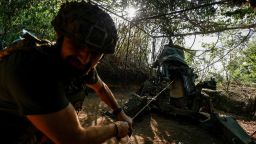 A Ukrainian serviceman of the 148th Separate Artillery Brigade of the Ukrainian Air Assault Forces, fires a M777 howitzer toward Russian troops near a front line, amid Russia’s attack on Ukraine, in Donetsk region, Ukraine May 1, 2024.