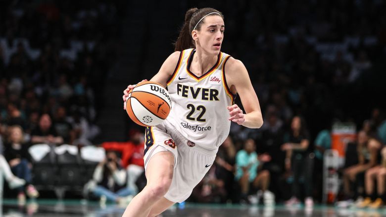 May 18, 2024; Brooklyn, New York, USA;  Indiana Fever guard Caitlin Clark (22) drives to the basket in the first quarter against the New York Liberty at Barclays Center. Mandatory Credit: Wendell Cruz-USA TODAY Sports