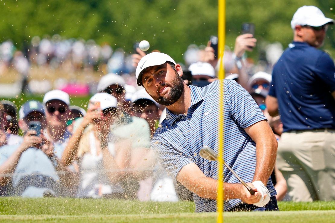 Scheffler escapes a bunker during the final round.