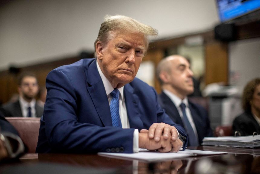 Former President Donald Trump sits in a courtroom before the start of the day's proceedings in Manhattan Criminal Court, 100 Centre St. in Lower Manhattan, May 20, 2024.