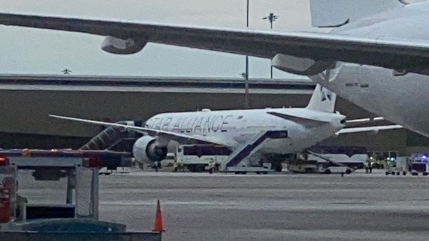 A Singapore airline aircraft is seen on tarmac after requesting an emergency landing at Bangkok