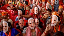 Supporters of India's Prime Minister Narendra Modi wear masks of his face, as they attend an election campaign rally in Meerut, India, March 31, 2024. Modi is now seeking a third consecutive term in general elections. If, as widely expected, Modi wins the polls, which conclude on June 1 with vote-counting set for June 4, he will be only the second person after Indian independence hero and first prime minister Jawaharlal Nehru to serve three consecutive terms.       REUTERS/Anushree Fadnavis       SEARCH "FADNAVIS MODI LOOKALIKES" FOR THIS STORY. SEARCH "WIDER IMAGE" FOR ALL STORIES.      TPX IMAGES OF THE DAY