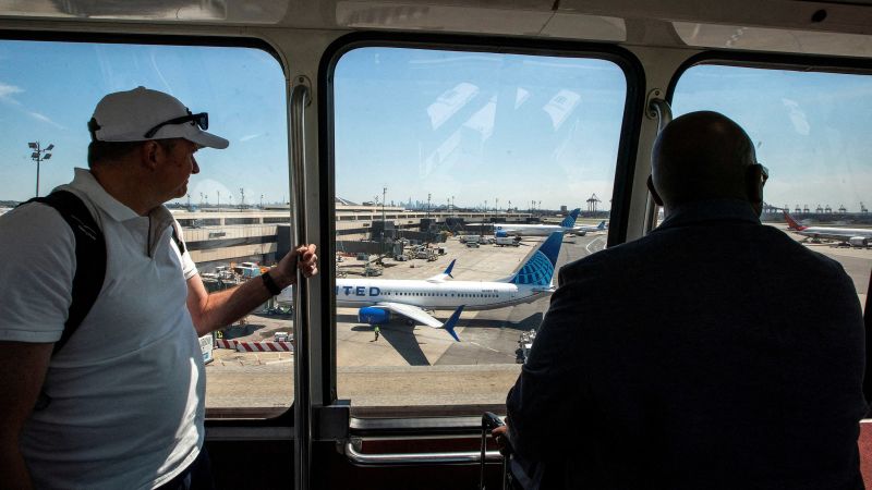 Travellers arrive to the Newark Liberty International Airport during the Memorial Day weekend in Newark, New Jersey, May 24, 2024.