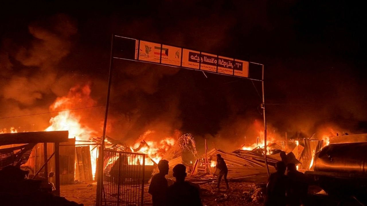 In this picture taken from a video, fire rages following an Israeli strike on an area designated for displaced Palestinians in Rafah in the southern Gaza Strip, on May 26, 2024.