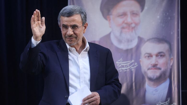 Mahmoud Ahmadinejad, the former president of Iran, waves at a press conference after registering as a candidate for the presidential election at the Interior Ministry, in Tehran, Iran June 2, 2024.