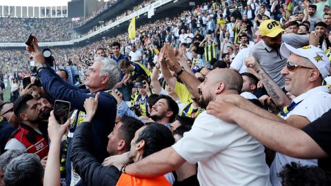 José Mourinho takes a selfie with Fenerbahçe fans after being unveiled as the club's new manager.