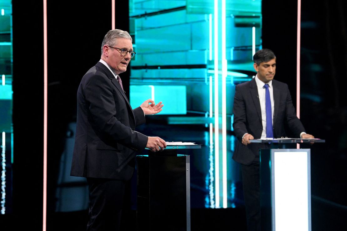 Britain's Labour Party leader Keir Starmer debates with Conservative Party leader and Prime Minister Rishi Sunak in the first live election debate hosted by ITV in Manchester, UK, on June 4, 2024.