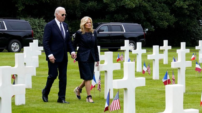 U.S President Joe Biden and first lady Jill Biden walk at the Normandy American Cemetery and Memorial in Colleville-sur-Mer, France, June 6, 2024. REUTERS/Elizabeth Frantz

