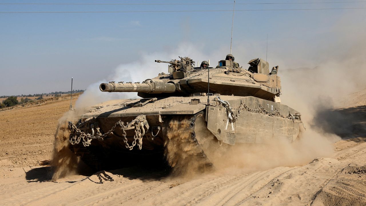 A tank manoeuvres near the Israel-Gaza border, amid the ongoing conflict between Israel and Hamas, as seen from Israel, June 6, 2024. REUTERS/Amir Cohen