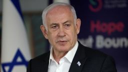 Israeli Prime Minister Benjamin Netanyahu speaks during a press conference at the Sheba Tel-HaShomer Medical Centre, in Ramat Gan on June 8, 2024 amid the ongoing conflict in the Palestinian territory between Israel and the militant group Hamas. Israel said its forces rescued four hostages alive from a Gaza refugee camp on June 8 as it intensified an assault despite scrutiny over a deadly strike on a UN-run school there. The four had been kidnapped by Hamas from the Nova music festival during the October 7 attacks that sparked the war, the army said.  JACK GUEZ/Pool via REUTERS