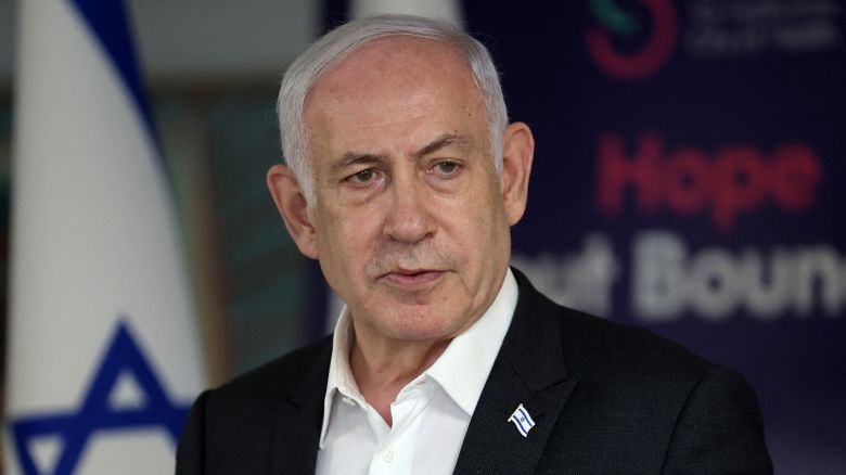 Israeli Prime Minister Benjamin Netanyahu speaks during a press conference at the Sheba Tel-HaShomer Medical Centre, in Ramat Gan on June 8, 2024 amid the ongoing conflict in the Palestinian territory between Israel and the militant group Hamas. Israel said its forces rescued four hostages alive from a Gaza refugee camp on June 8 as it intensified an assault despite scrutiny over a deadly strike on a UN-run school there. The four had been kidnapped by Hamas from the Nova music festival during the October 7 attacks that sparked the war, the army said.  JACK GUEZ/Pool via REUTERS