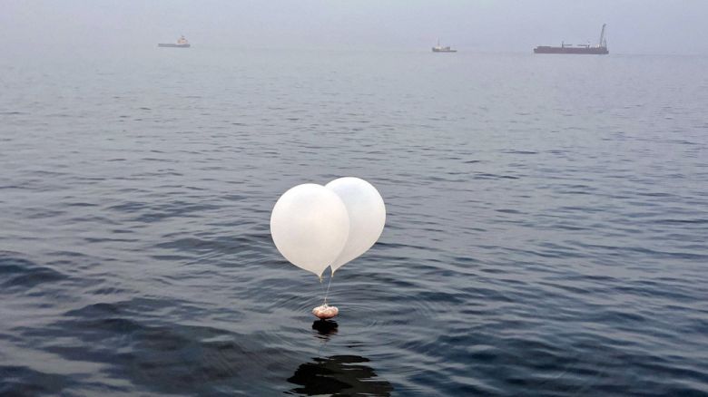 A balloon carrying various objects, including what appeared to be trash, believed to have been sent by North Korea, is pictured at the sea off Incheon, South Korea, June 9, 2024.