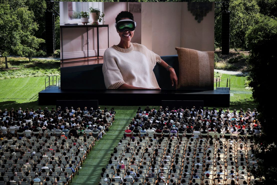 People attend the annual developer conference event at Apple's headquarters in Cupertino, California, on June 10, 2024.