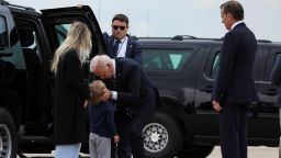 U.S. President Joe Biden embraces his grandson, Beau Biden, as his daughter-in-law, Melissa Cohen Biden, and his son, Hunter Biden, who earlier in the day was found guilty on all three counts in his criminal gun charges trial, stand by after the president arrived at the Delaware Air National Guard Base in New Castle, Delaware, U.S., June 11, 2024. REUTERS/Anna Rose Layden

