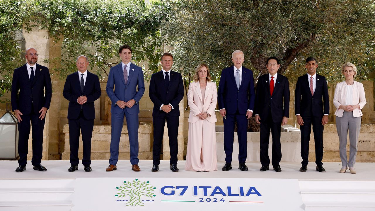 Italy's Prime Minister Giorgia Meloni, U.S. President Joe Biden, France's President Emmanuel Macron, Canada's Prime Minister Justin Trudeau, Germany's Chancellor Olaf Scholz, Britain's Prime Minister Rishi Sunak, Japan's Prime Minister Fumio Kishida, European Commission President Ursula von der Leyen and President of the European Council Charles Michel pose for a family photo on the first day of the G7 summit at the Borgo Egnazia resort, in Savelletri, Italy June 13, 2024. REUTERS/Guglielmo Mangiapane