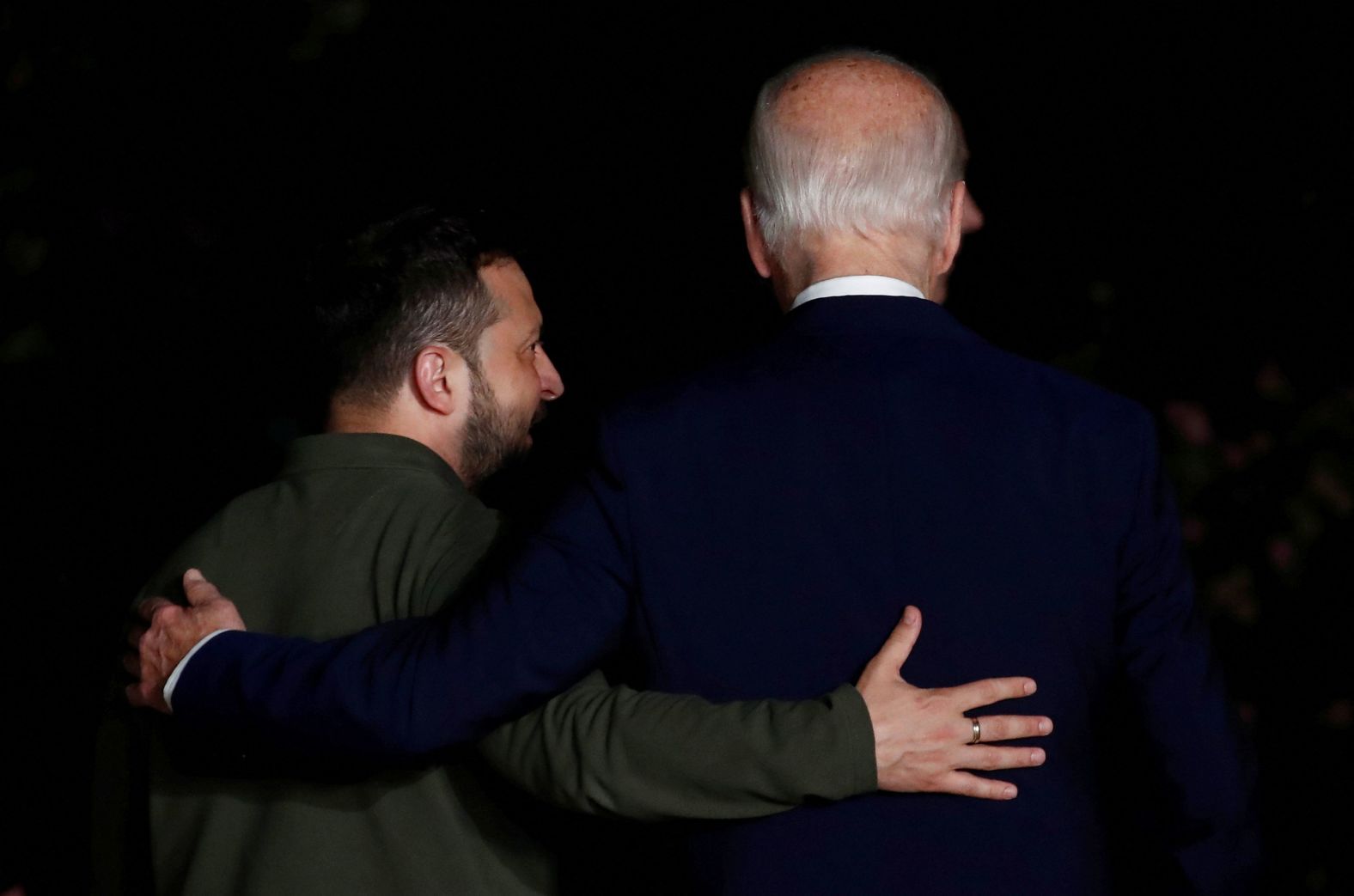 US President Joe Biden, right, and Ukrainian President Volodymyr Zelensky walk together after meeting on the sidelines of the G-7 summit in Italy on Thursday, June 13. Their two countries signed a <a href="https://www.cnn.com/europe/live-news/biden-zelensky-g7-summit-06-13-24#h_54da67b714e1bb8b1f84f97021e079ca">bilateral security pact</a>.